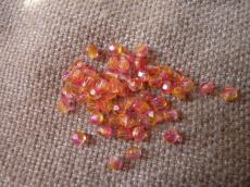 csiszolt gyöngy 4 mm: narancs-pink bevonatos kristály 50 db