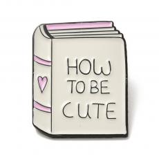 kitűző: könyv felirattal: hogyan legyünk aranyosak? - how to be cute