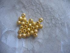 8 mm csillagporos arany színű gömb 10 db