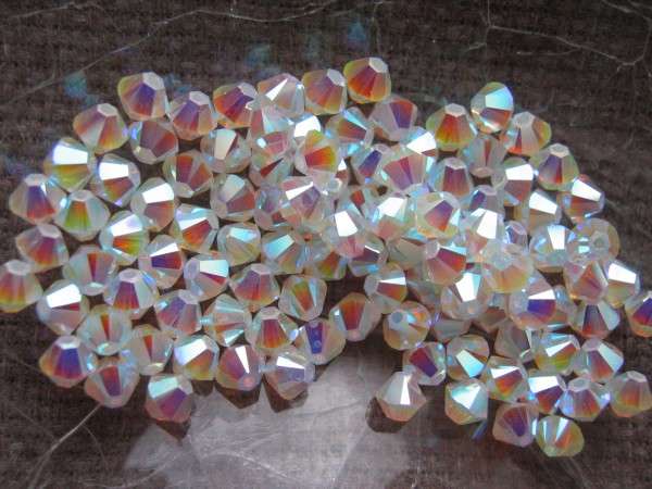 sw bicone 4 mm: white opal AB2x Xilion