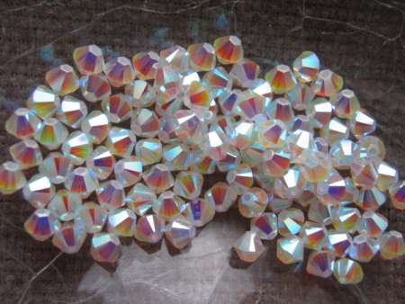 sw bicone 4 mm: white opal AB2x Xilion