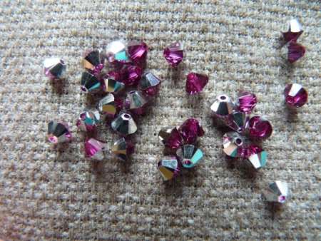 sw bicone 4 mm fuchsia CAL Xilion